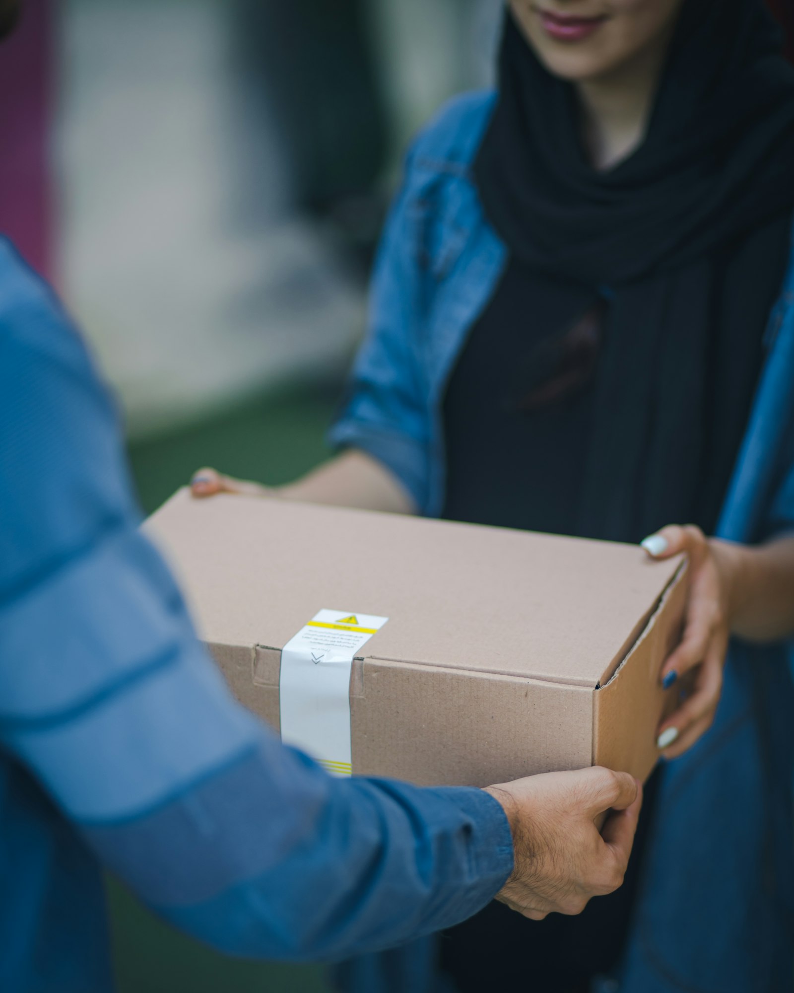 In-house delivery courier handling packages
